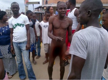 Man stripped to his underwear and flogged by residents for 