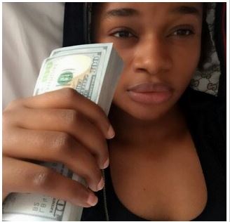 Nigerian Female Rapper Splash Shows Off Wads Of Dollar Notes On