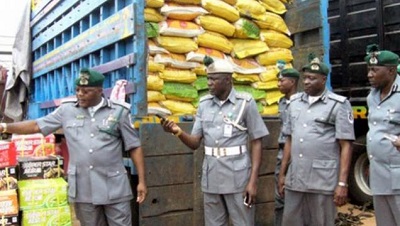 Image result for Customs warns against Importing rice through land borders