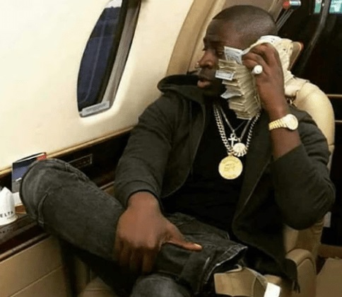 Son of Incoming President of Zimbabwe Caught Flaunting Cash and Luxury Car on Social Media (Photos)