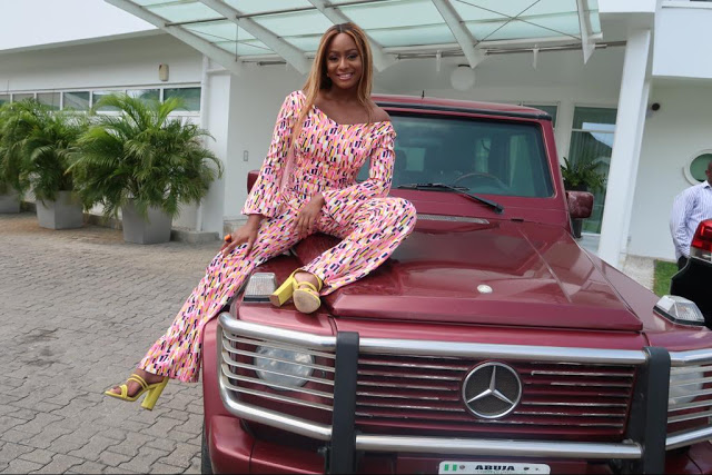 Billionaire Daughter, DJ Cuppy Poses On Her Bulletproof G-Wagon Wearing Jumpsuit (Photos)