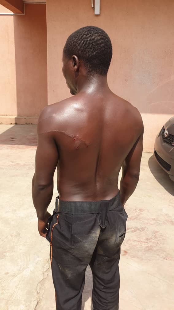 The gateman assaulted by the soldiers