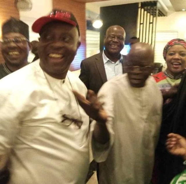 Tinubu Poses With PDP Members In Lagos, After Throwing Away APC Flag During Ogun Rally