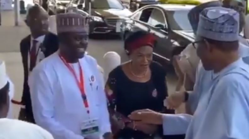 Buhari refusing to shake hands with Remi Tinubu
