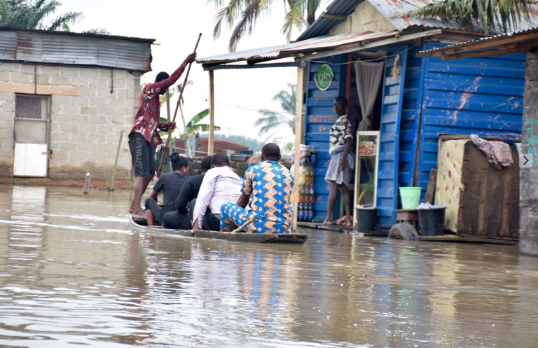 In Flooded Lagos Community, Canoe Replaces Uber And Children Are On ...