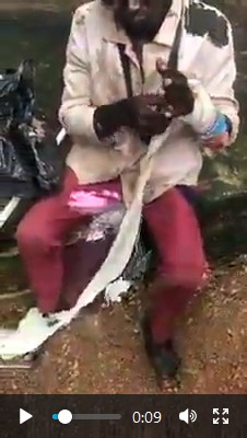 The fake beggar after he was caught