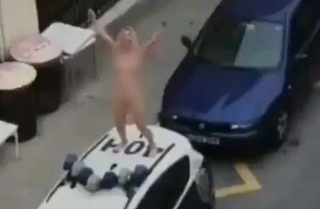 Woman strips after violating lockdown order