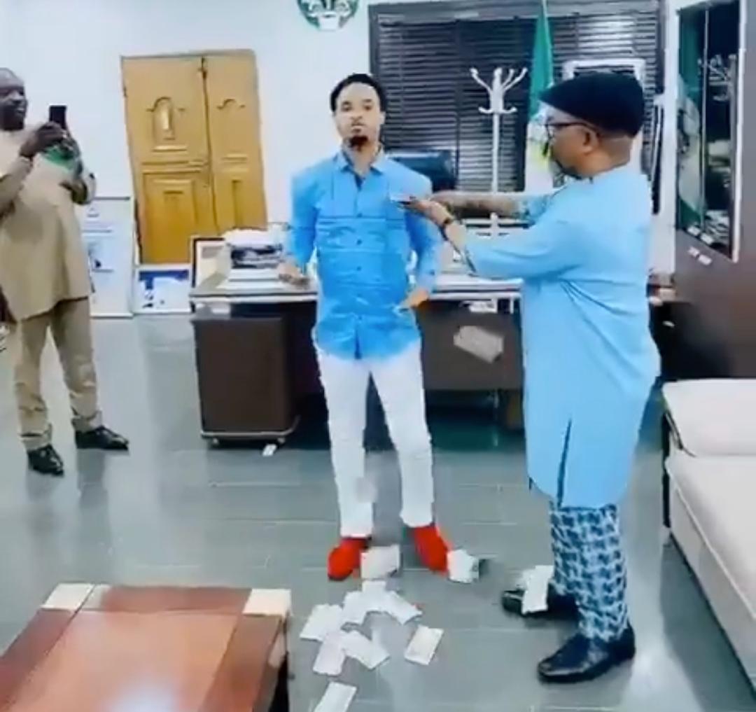 Abia Governor's Chief Of Staff Caught On Camera Showering Cash On Odumeje In His Office