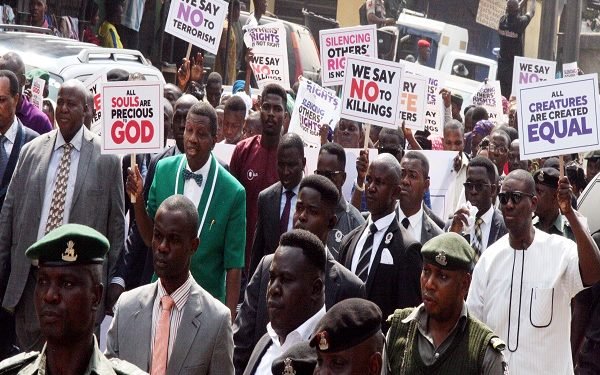 Pastor Adeboye leading his members on a protest