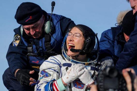 NASA astronaut Christina Koch reacts shortly after landing of the Russian Soyuz MS-13 space capsule in a remote area southeast of Zhezkazgan in the Karaganda region of Kazakhstan, February 6, 2020. Sergei Ilnitsky/Pool via REUTERS