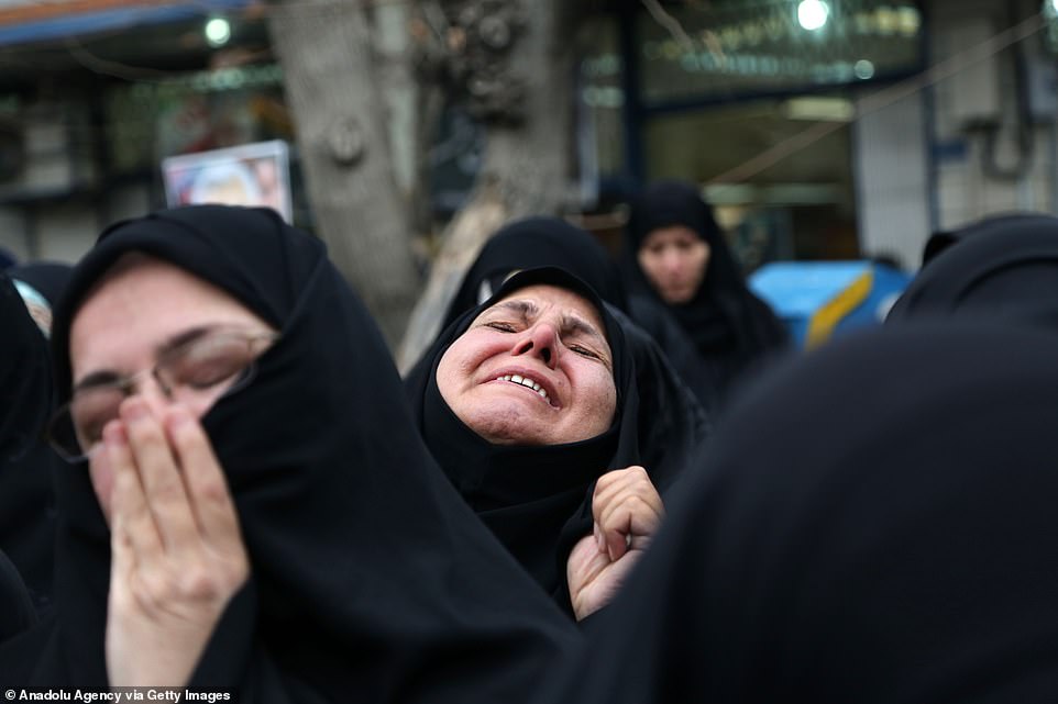 Iranian women crying after death of leader of Iran's Quds force, Qassem Soleimani