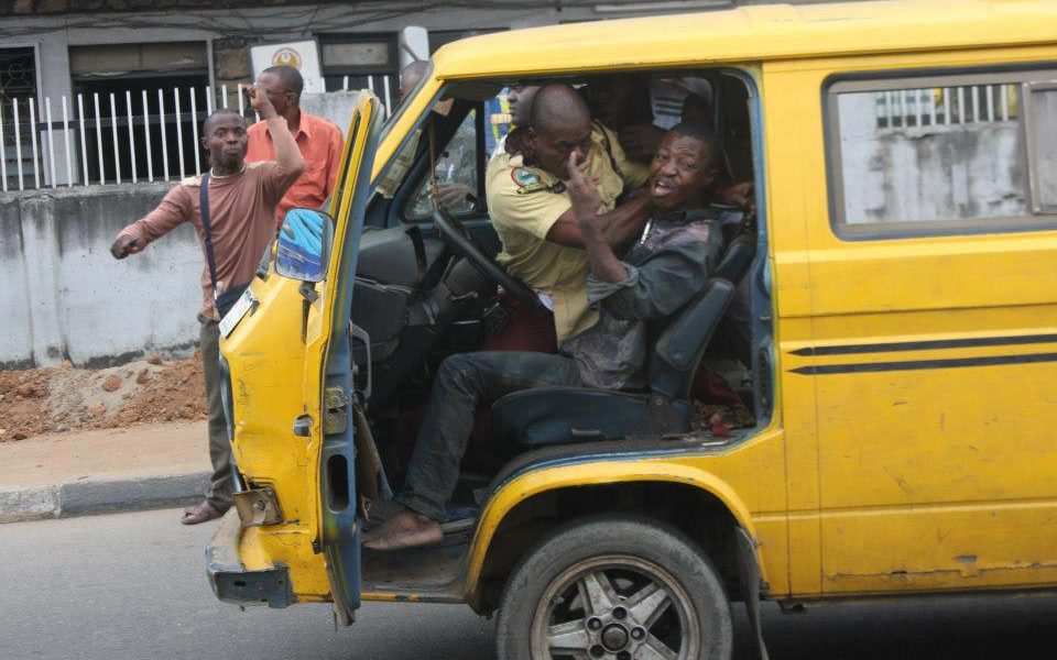 A Lastma official dragging steering wheel with a driver