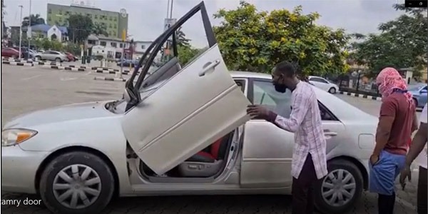 Camry car with Lamborghini doors