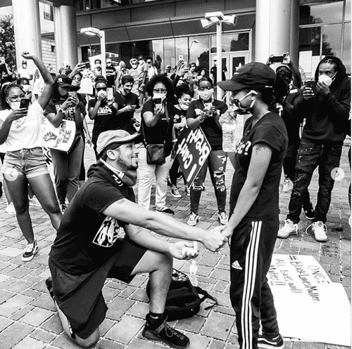 Xavier Young proposing to his girlfriend