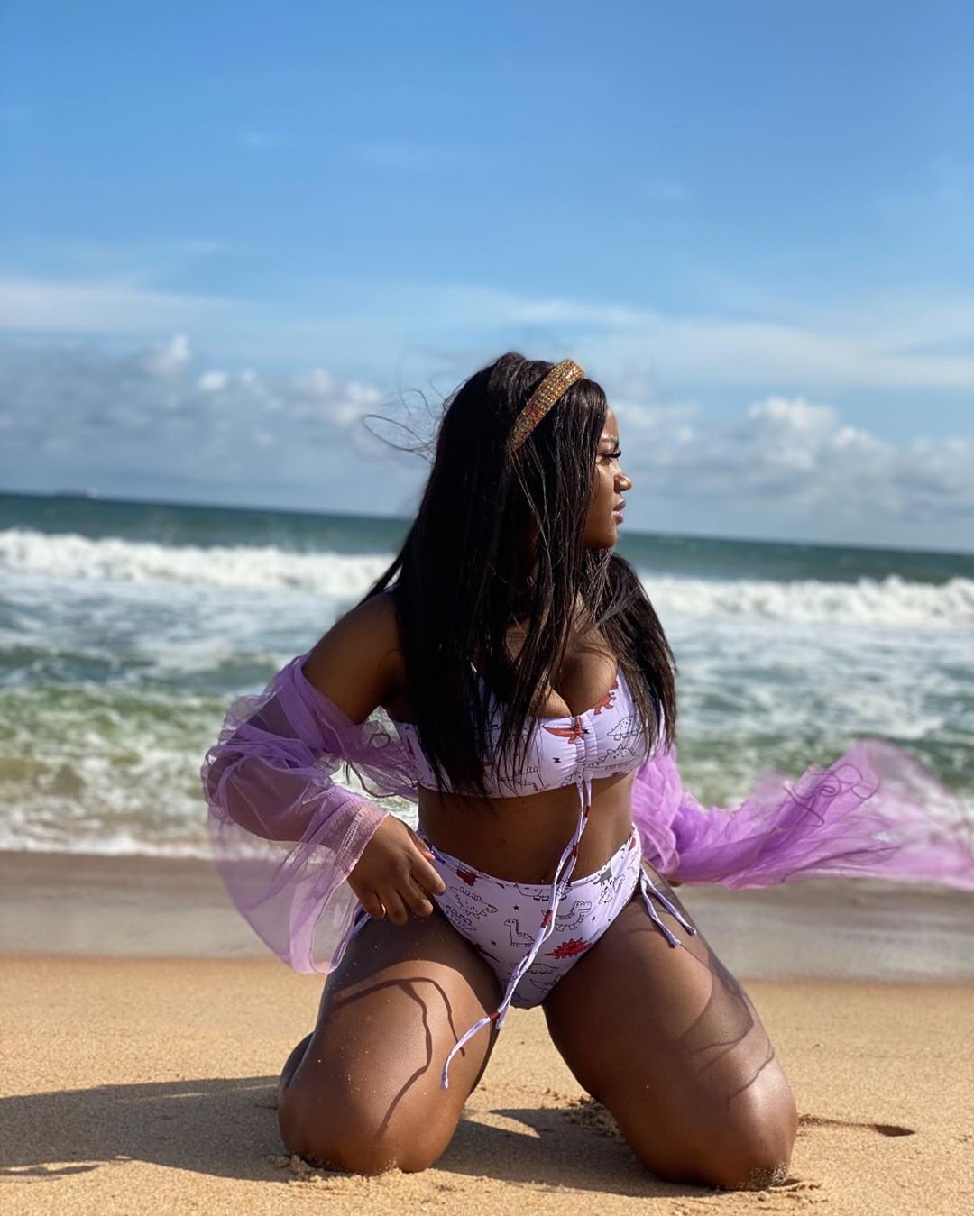 Chioma Avril shows off new photos by the beach