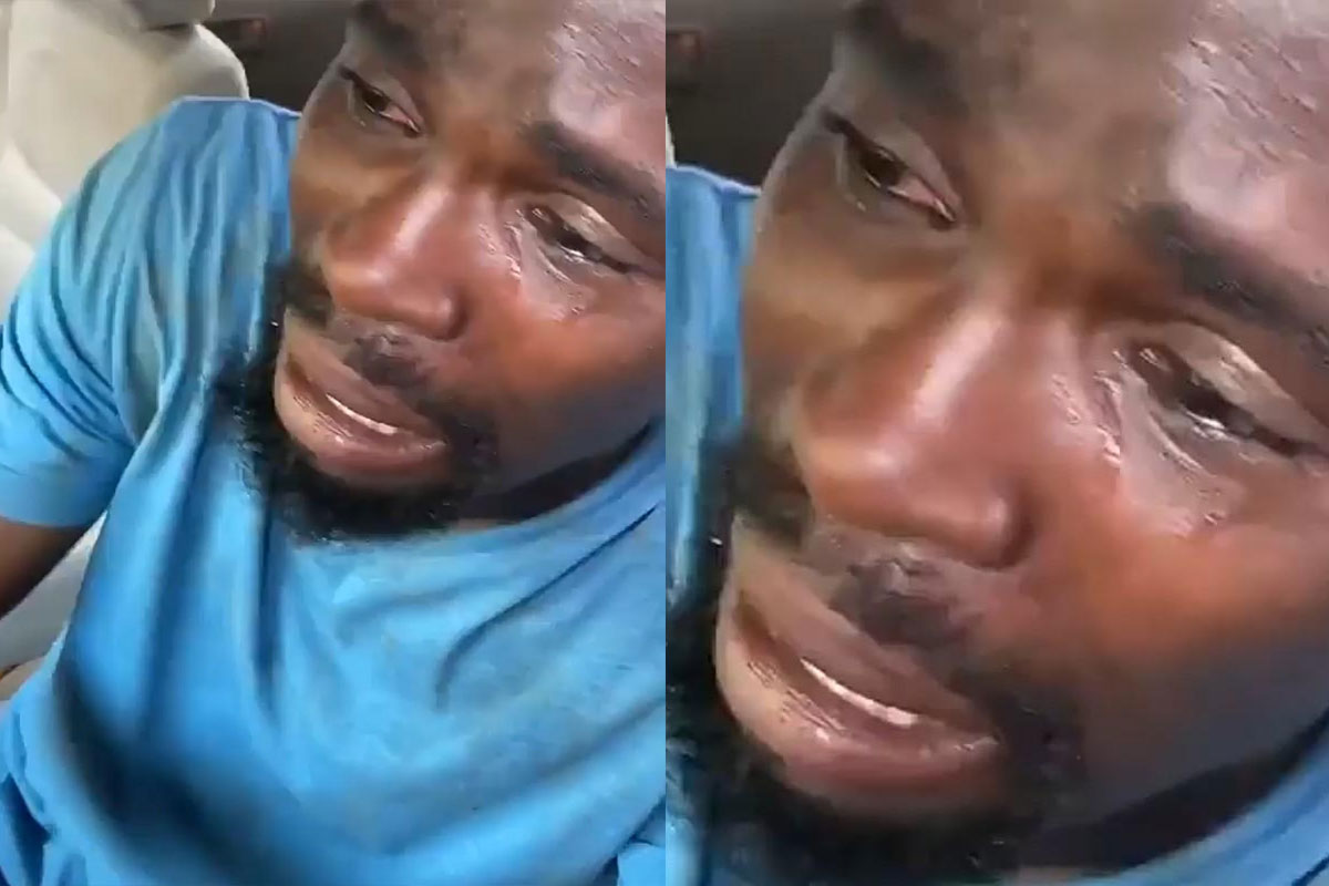 Man cries after his car was vandalized in Abuja