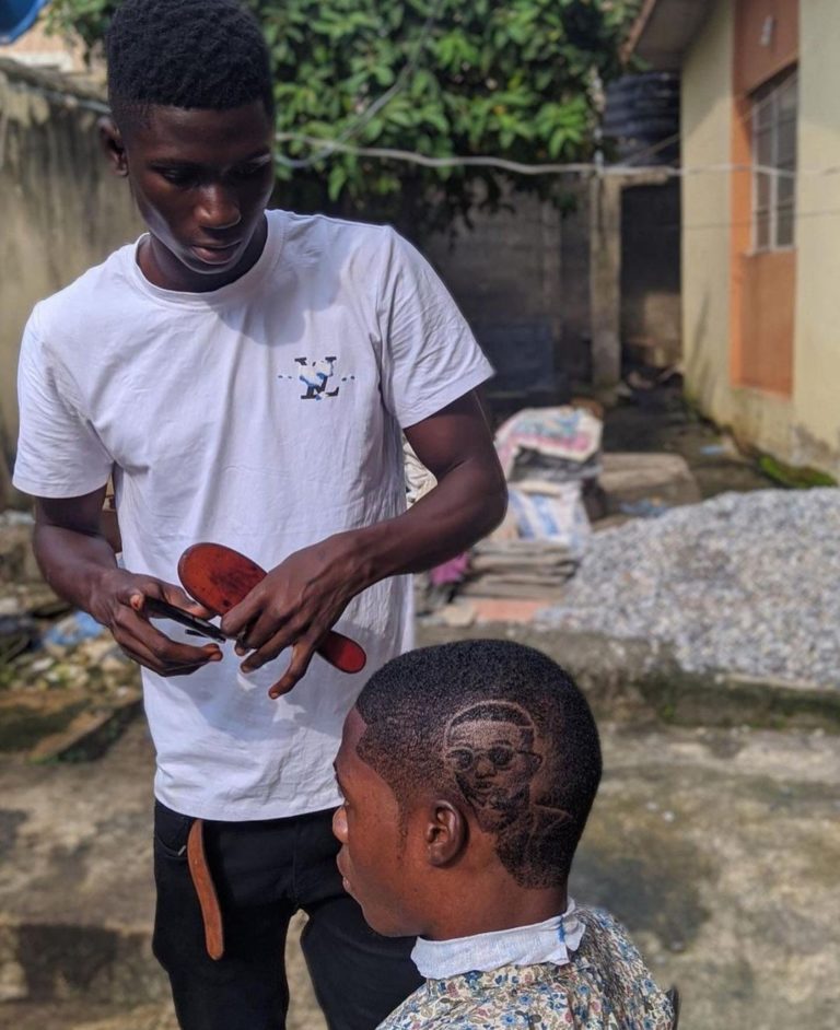The barber carved Wizkid's face on a customer's hair