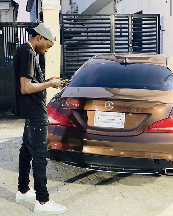 Naira Marley gifts brother a new car