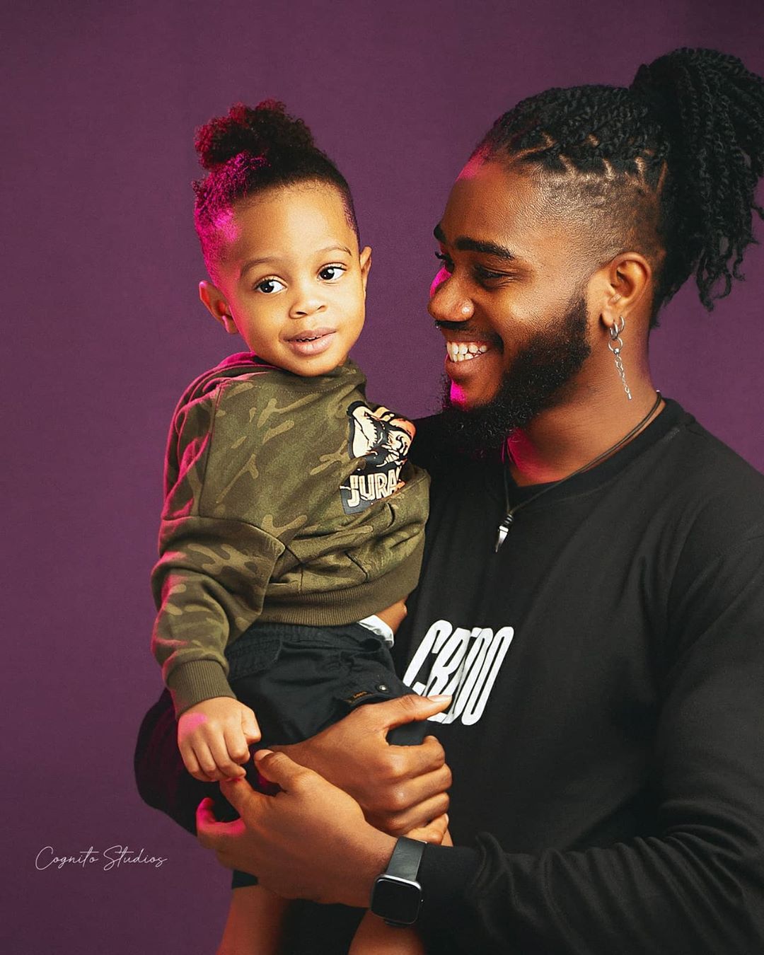 Praise Nelson and his son