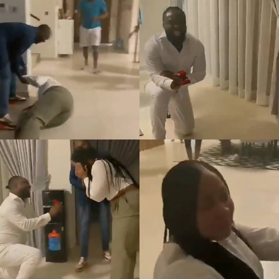 Girl rolls on the floor after being proposed to by her man