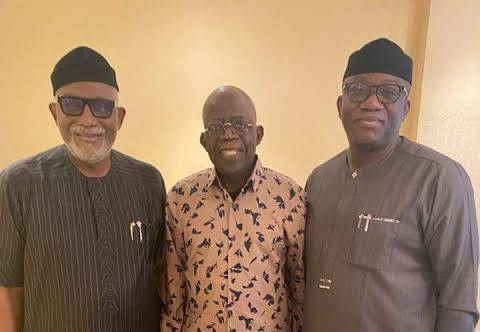 Tinubu posing with two APC governors in London