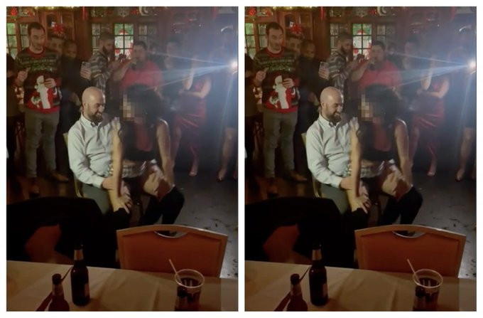 The officer getting a lap dance from a junior officer