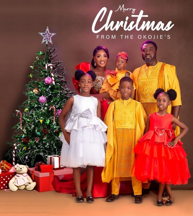 Mercy Johnson posing with her family to celebrate Christmas