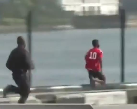 Protester runs