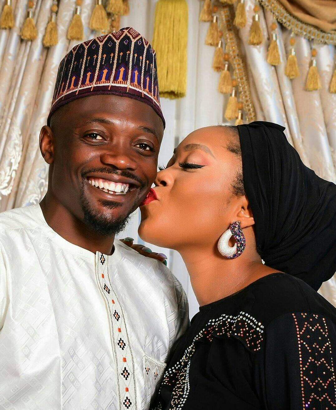 Musa's controversial photo of him kissing his wife