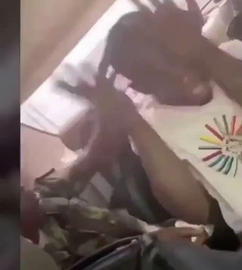 Soldier assaulting a civilian