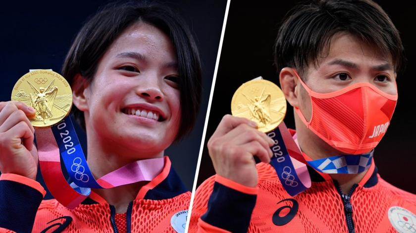 The siblings made history winning gold on the same day