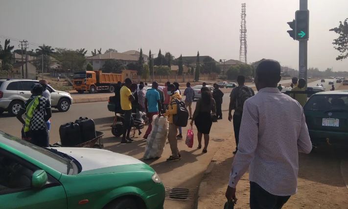 People trekking home