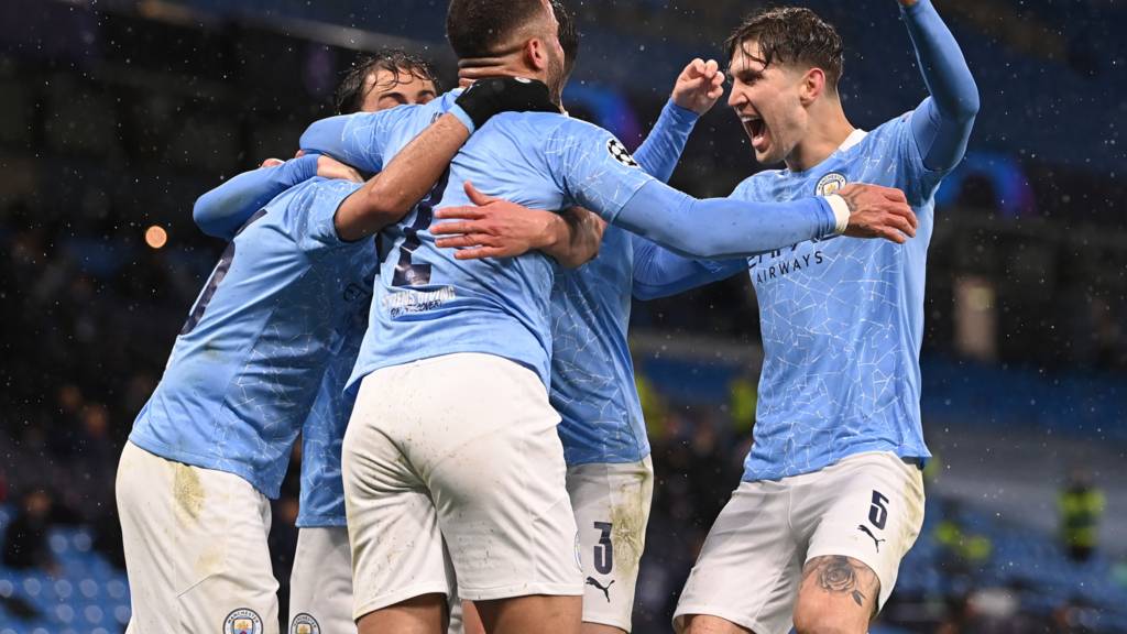 Machester City players jubilate