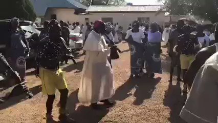 Bishop Kukah dancing and having fun with the troupe