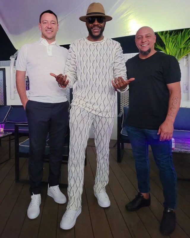 Ebuka posing with the football stars