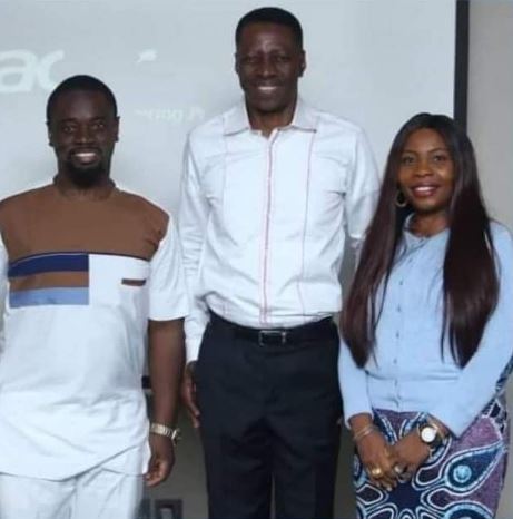 The couple posing with Pastor Adeyemi
