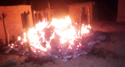 Bandits burn house