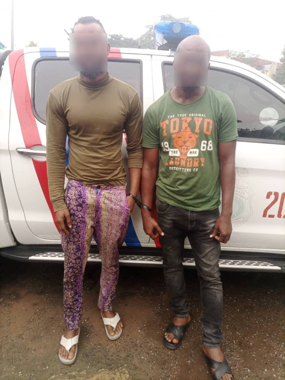 Two Men Caught Allegedly R3ping Lady Inside Car In Lagos (Photo)