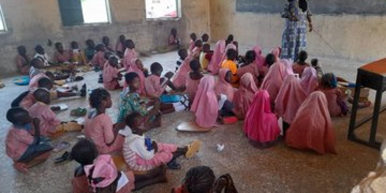 Pupils And Teacher Sit On Bare Floor, Mat In Adamawa School (Photos)