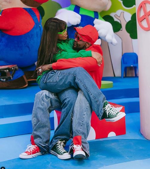 Kizz Daniel and wife