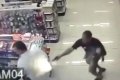 Police Officer Shoots 2 Armed Robbers Dead Inside Pharmacy While Carrying a Baby Boy in His Arm (Video) 