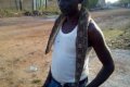 Fearless Nigerian Man Hangs Snake Around His Neck (Photos)