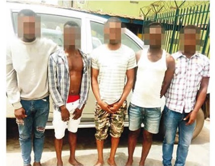 Image result for Nigerian Police Arrest 5 Gay Men Fighting After Contracting HIV (Photos)