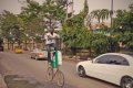 Wow! Man Spotted Riding A Bicycle Taller Than Most Cars On Lagos Road (Photos)