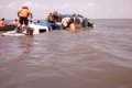 Narrow Escape: All Passengers Pulled Out Alive After Their Boat Sank In Bonny, Rivers State (Video)