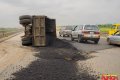 Truck Overturns And Pours Contents On Lagos-Ibadan Expressway After Its Tyre Burst While In Motion 