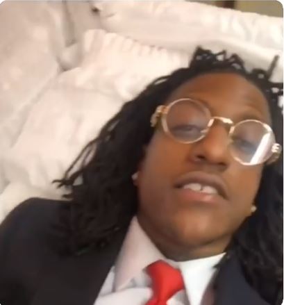 So Reckless: Popular Rapper Seen Shooting Music Video From Inside A Coffin