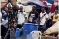 Show Of Strength: See How A Man Balanced A Big Stone And Table On His Teeth In Ikorodu (Photos)