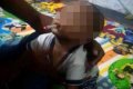 Shocker: Father In Trouble For Making His Baby Boy Smoke Cigarette (Photo)