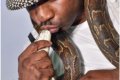Lagos Socialite, Pretty Mike Seen Kissing His Python Snake (Photo)